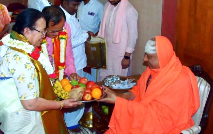 His Holiness Jagadguru Sri Shivarathri Deshikendra Mahaswamiji blessing Union Minister of State for Education and External Affairs Dr. Rajkumar Ranjansingh and his wife, during the latter's visit to Suttur Srikshetra recently.