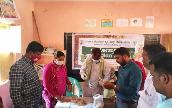 JSS Krishi Vigyan Kendra Senior Scientist and Incharge Head Smt. Divya H.V. explained to the participants the significance of seed treatment and demonstrated.