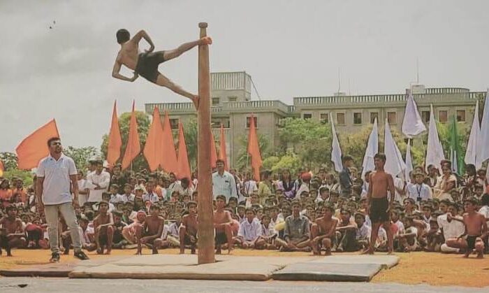 Students performed several postures on the Mallkambh, during the program held at the JSS School, in Suttur, as part of the 75th Indian Independence Day celebrations.