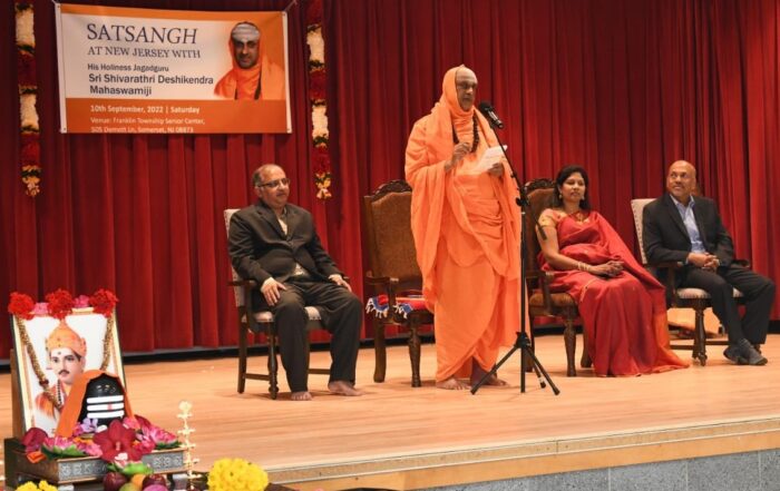 His Holiness Jagadguru Sri Shivarathri Deshikendra Mahaswamiji giving his blessings at the Satsang program organized by the Veerashaiva Samaja, in New Jersey, USA, on September 10. VSNJ President Sri Omkarmuthy Murundi, Brindavana Kannada Sangha President Smt. Padmini and HSBB Vice-President Dr. Babu Kilar Veeregowda are seen in the picture.