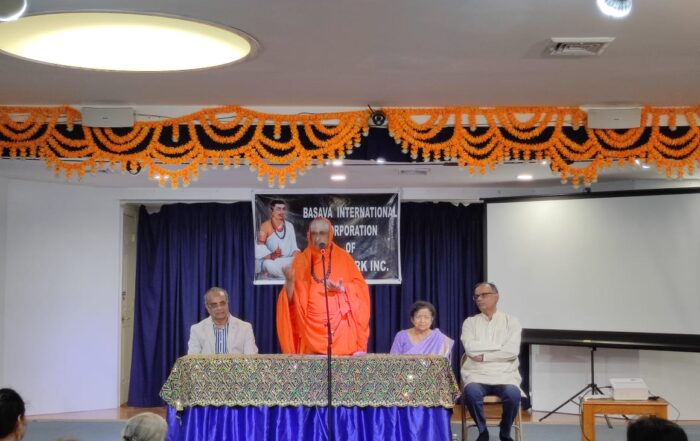 His Holiness Jagadguru Sri Shivarathri Deshikendra Mahaswamiji giving his blessings at the Satsang program organized by the Basava International Corporation, held at New York, USA on September 11. Sri Ravishankar Bopalapura, Smt. Satya Vishwanath and Dr. Anil Patil are seen in the picture.
