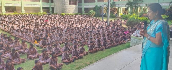 Smt. Shobha Patil, Trainer, Pyramid Valley International, Bengaluru, talking at the mass meditation training class held at the JSS Free Residential School, Suttur.